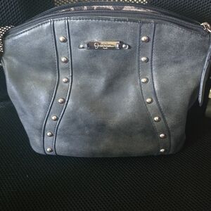 Jessica Simpson Black and Silver Shoulder Bag with Structured Design